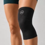 Rodillera Photon negra de formato tubular colocada sobre la rodilla